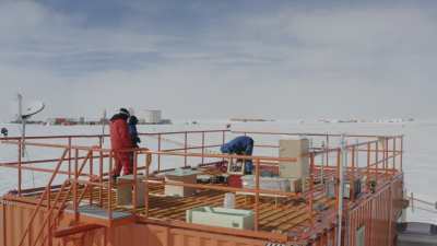 Outside work on the roof of a scientific shelter