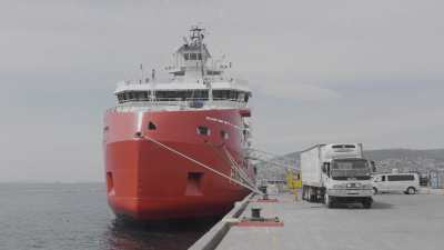 Loading of the French Navy polar patrol and supply icebreaker l'Astrolabe before a trip to Antarctica