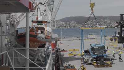 Loading of the French Navy polar patrol and supply icebreaker l'Astrolabe before a trip to Antarctica