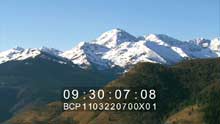 Snowy peaks of Pyrénées, the city