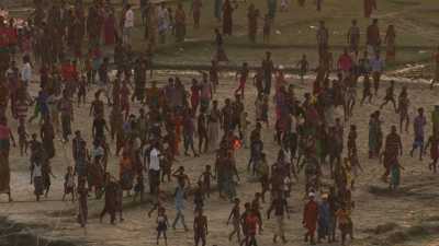 Men, women and children near the Friendship Hospital