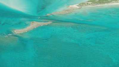 Shallow waters, sandbanks, green islands