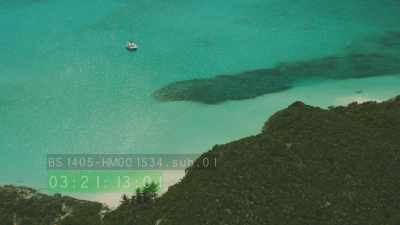 Flight over desert islands, sailboat, sea grass bed