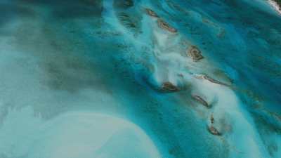 Small islands and sandbars in clear waters