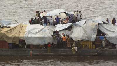 A barge, unique access to the villages