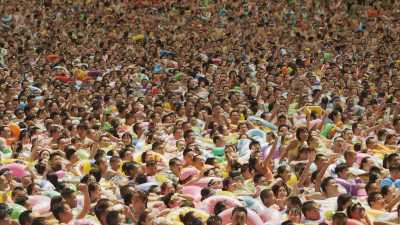 The overcrowded city wave swimming pool