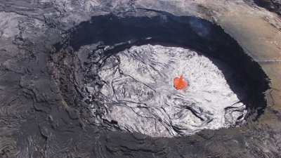 Red-hot lava sport in the midst of the lava lake