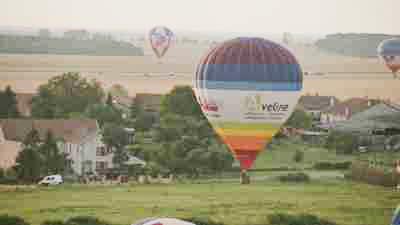 Air balloon landing in a field