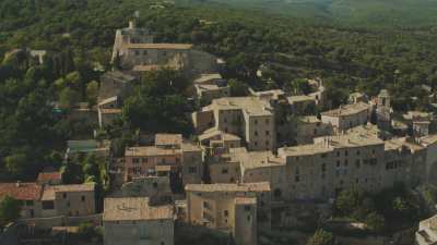 Provence village, bell tower, forests and lavender fields