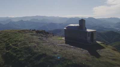 Chapel on top of the hill, winding road