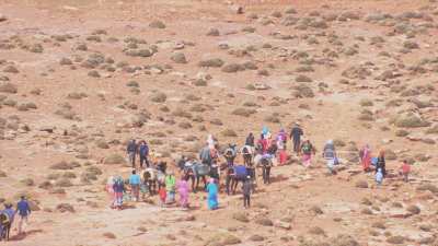 Peasants who fetch water from the spring in the mountains of the Timnkar plateau