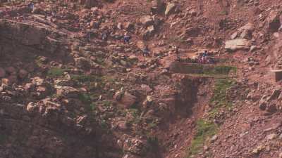 Peasants who fetch water from the spring in the mountains of the Timnkar plateau