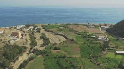 Small village with mosque between the mountains, near the coast, Oued Laou