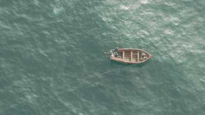 fishermen collecting red algae