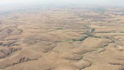 Arid orange hills and river