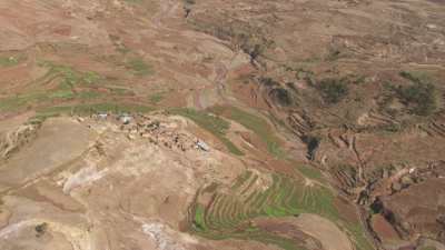 A small isolated village surrounded by agriculture