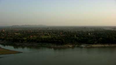 Bagan temples and lake at sundown