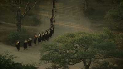 Monks procession among Bagan temples