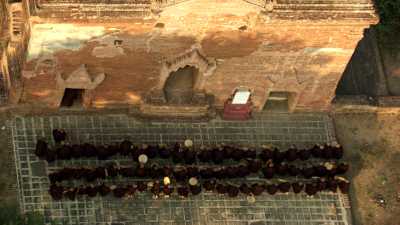 Monks ceremony in front of a temple