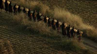 Monks procession among Bagan temples