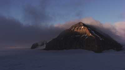 Svalbard, peaks in the clouds