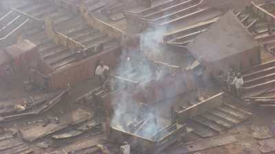 Close shots on workers in ship-breaking yards