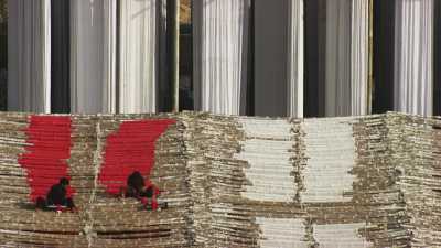 Close shots of workers in a textile dying factory close to Karachi