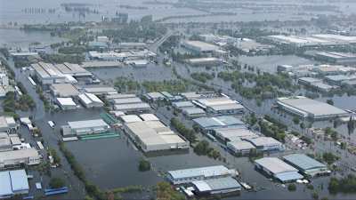 Flooded districts, boats circulating