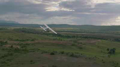 Plane over savanna, old growth forest, Tepuis