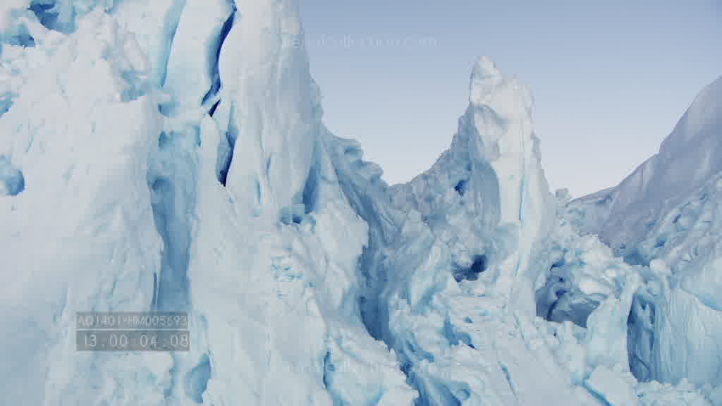 Spectacular flight through a canyon on the Astrolabe Glacier at dusk in summer.