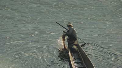 Fisherman in Pirogues Backlit