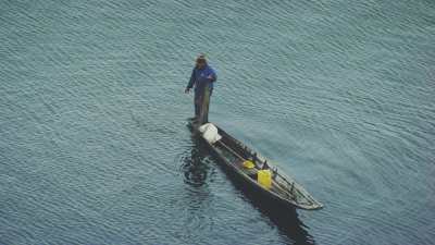 Fishermen in dugout canoes