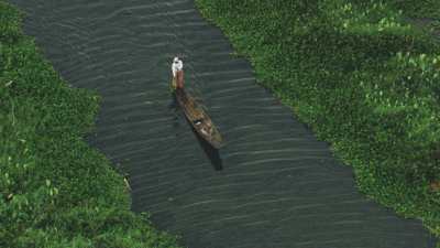 Fishermen in dugout canoes